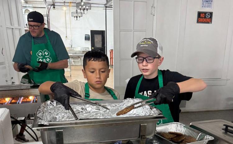 FLOYD FLIPPERS The Floyd County 4-H Grilling Games participants had a good time helping with the Punkin Days Pancake Breakfast on Saturday, Oct. 11. MORE PHOTOS, PAGE 8 | COURTESY PHOTOS