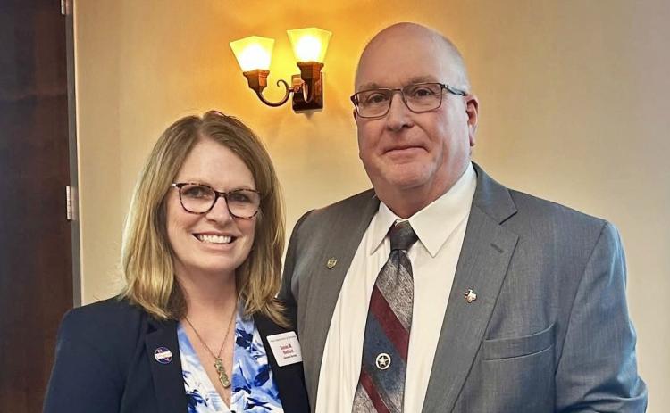 SERVICE TO STATE Susan Redford, Executive Director of the Texas Association of Counties (left) presented award and Floyd County Judge Marty Lucke with an award recognizing his decade of service on the TAC UCF board of directors. | TEXAS ASSOCIATION OF COUNTIES
