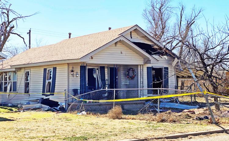 BARRICADED INSIDE this house on W. Grover St. in Floydada for several hours, fugitive Alberto Guerrero was taken into custody around 3 a.m. Saturday. Guerrero is jailed on a $3 million bond. | HESPERIAN-BEACON