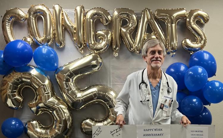 FROM DELIVEREDTO DELIVERING, Dr. Kevin Stennett of Lockney has experienced it all—and has no intention of slowing down. Staff honored him with a party last week. | COURTESY PHOTOS