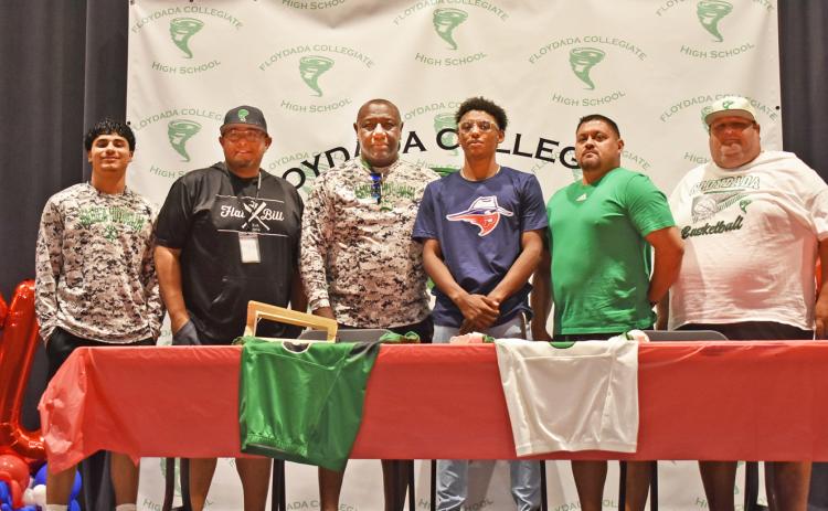 HENDERSON SIGNS Tyrean (Ty) Henderson, a 2025 Floydada Collegiate High School graduate and athlete, has committed to play football for the Oklahoma Panhandle State University Aggies. He officially signed his letter of intent on May 27, 2025 with family, friends and coaches in attendance. | COURTESY PHOTO