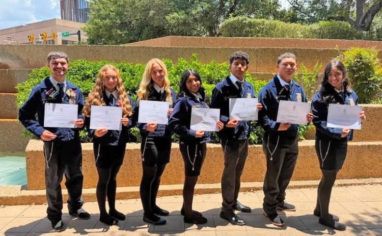 CONGRATULATIONS go to seven Floydada Collegiate High School students who earned their Texas FFA Lone Star Degrees last week at the 98th Annual Texas FFA Convention in Fort Worth. Receiving degrees were, from left, Kanon Rainwater, Rilynn Hinsley, Madison Pyle, Nalia Ordonez, Armando Chavarria, David Sanchez and Aivery Bennett. | FLOYDADA CISD PHOTO
