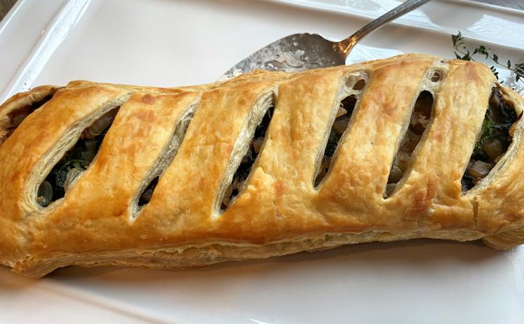 DECADENT BUT LIGHT While the pastry crust for this dish is decadent, filled with light ingredients like mushrooms, spinach, and caramelized onions, it doesn’t make me fill stuffed. | ANGELINA LaRUE PHOTO