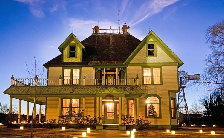THE 1908 BARTON HOUSE has become one of the most popular attractions for Candlelight at the Ranch visitors during four decades of celebrating a pioneer Christmas. The National Ranching Heritage Center will host the annual family-friendly event from 6:30 p.m. to 9 p.m. Dec. 10 and 11. | COURTESY PHOTO by Shelby Schwartz