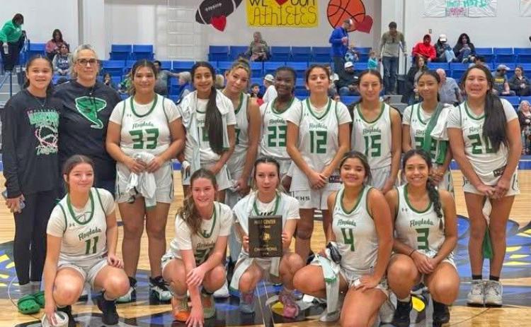 The Lady Winds Junior Varsity basketball team brought home the first-place trophy from the Hale Center Tournament. They beat four teams to capture first place. Lady Winds are (front row, from left) Jessa Louallen, Korbin Womack, Tiffany Perez, Miley Morales, Addison Hinson; (back row, from left) Aybree Taylor, Coach Abby Sanders, Nayohmi Garcia, Mia Casares, Tyra Gonzales, Amareah Taylor, Ariel Falcon, Kyra Segura, Kyra Williams, Aubri Martinez. | FLOYDADA CISD PHOTO
