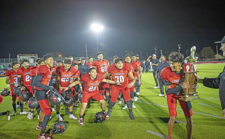 Longhorns keep county championship trophy