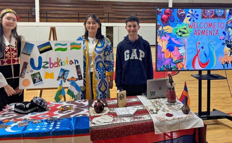 HAPPY INTERNATIONAL STUDENT WEEK Three of Lockney ISD’s six foreign exchange students, Zumrad Zhumabaeva, Shirin Reymbayeva and Mkrtich Frangyan, presented information about their home countries. | LOCKNEY ISD