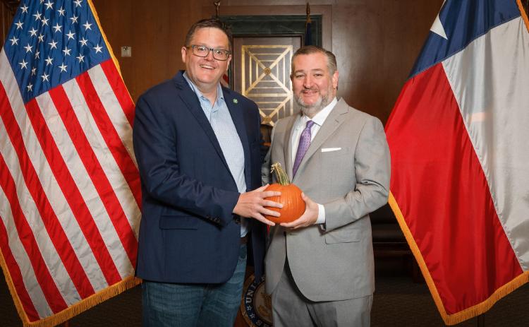 CROWING ABOUT FLOYDADA IN DC, left, was Floydada EDC director Ryan Crowe, who took a local pumpkin with him as a presentation to Texas Sen. Ted Cruz. | COURTESY