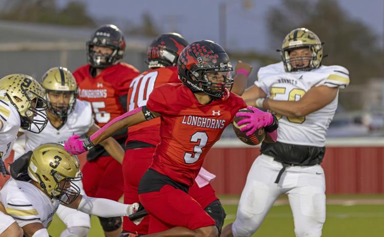 FORGING AHEAD In the battle to secure a playoff spot, the Longhorns now trail two undefeated district teams: the Sudan Hornets (2-0) and the Hale Center Owls (2-0).