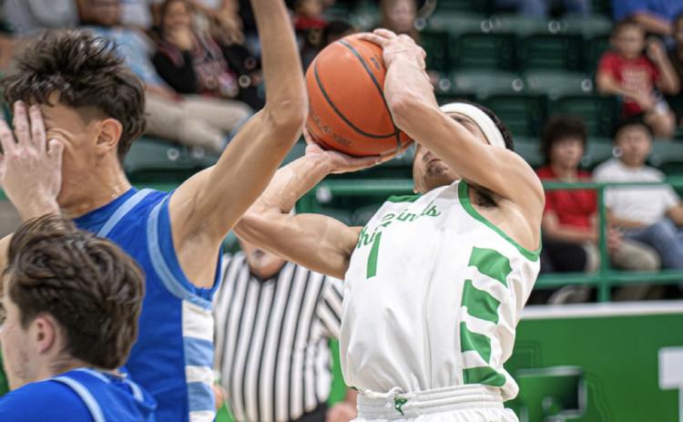 WHIRLWINDS WIN The Floydada Whirlwinds opened district play Friday night with a win over Tahoka 41-36. They were to face the Tulia Hornets Tuesday night in a non-district game. | NOAH FIERROS
