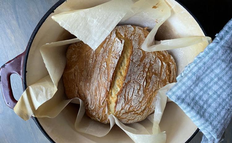 PEASANT AND PLEASANT With a soft center and crisp edges, this simple Dutch oven bread is delicious—also a really easy way to get started for those interested in baking fresh bread. | ANGELINA LaRUE PHOTO