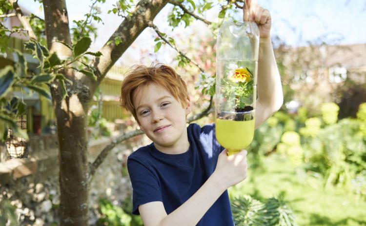 BOOKS ABOUT BUTTERFLIES Pique children’s curiosity in butterflies by taking them to a library—then help them make ther own observation chamber! | iSTOCK PHOTO