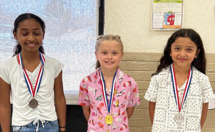 THIRD GRADE poster winners were, from left, Aaliya Henderson, 3rd place; Carson Kellison, 1st place; and Adalynn Perez, 2nd place. | COURTESY PHOTO