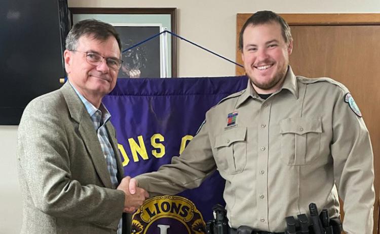 LIONS PRGRAM Rex Teachenor (left), president of the Floydada Lions Club, hosted Hollis Gregory (right), Texas Game Warden for Floyd and Hale County at the April 4 meeting. Both the Lions Club and the Rotary Club of Floydada meet each Tuesday at noon at the First United Methodist in Floydada.