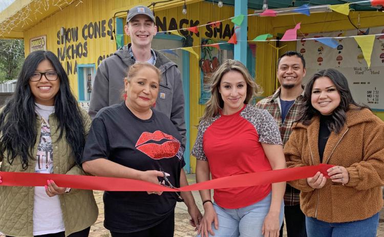 SNOW CONES AND MORE Floydada native Maricela Reyna, along with family and friends, recently cut the ribbon on her new enterprise, Snack Shack Snow Cones, which will open to the public on Wednesday. | COURTESY PHOTO